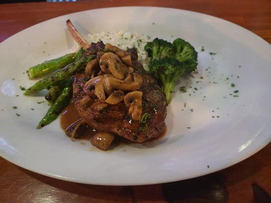 Grilled Veal Chop.
Parmesa Risotto, Marsala Mushrooms Sauce.