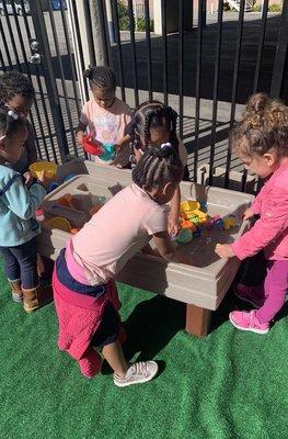 Sensory play, and interaction with friends