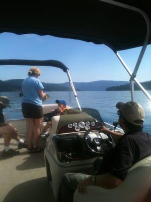 Uncle Gary takes the family out on the Pontoon Boat on Coeur d'Alene Lake.