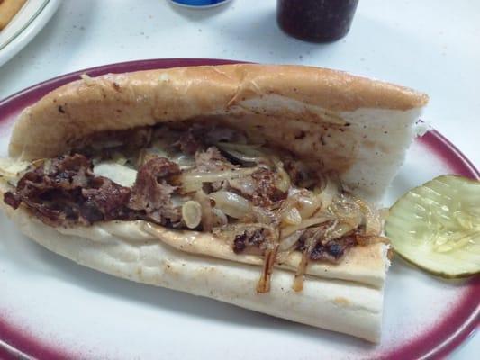 Cheesesteak with fried onions.