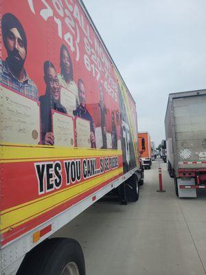 Toro trucks in line a the DMV