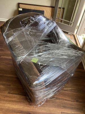 Chair protects with shrink wrap to prevent dust and tear damage.