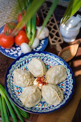 Manty/Dumplings-Finely chopped beef meat and onion seasoned with black pepper, and wrapped in handmade thin dough. steam cooked. served with