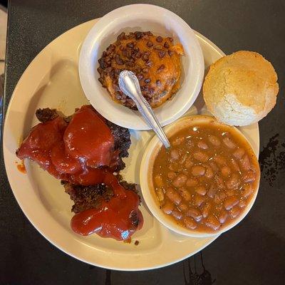 Meatloaf, sweet potato casserole and pintos.