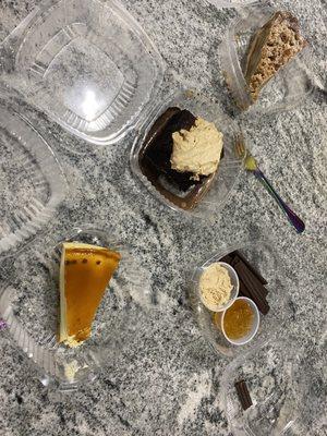 Cheesecake, apple pie, chocolate sticks, brownie with peanut butter mousse