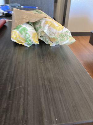 Sandwich wrapped like trash and shoved in a bag lik it's a burden to serve a sandwich.  Italian B.M.T. -