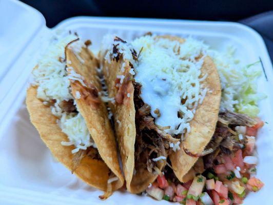 3 crispy tacos with carnitas