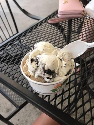 Oreo and coffee scoops in a double cup.