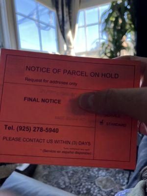 Deceptive mailer leading consumer to believe that they have a parcel on hold.