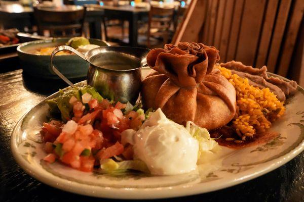 Chicken Chimichanga: fried flour tortilla stuffed with shredded chicken and Mexican cheese ($21).