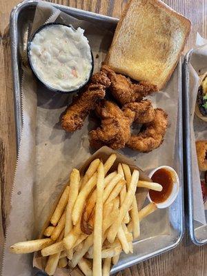 Chicken tenders, fries, toast and coleslaw