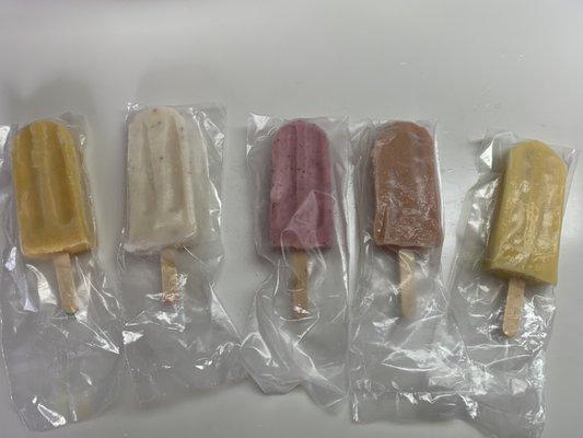 Mango, lychee, strawberry cream, guava cream, and lilikoi (passion fruit) paletas.