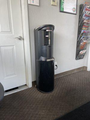 Water dispenser? Nice but where's the cups? Bring your own cups?