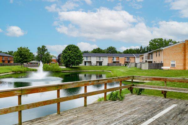 Deck overlooking a pond at Williamsburg on the Lake Apartments Mishawaka