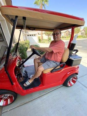 My honey with our new cart. We take it out all the time to pick up the mail, go to dinner, and sometimes a night cruise.