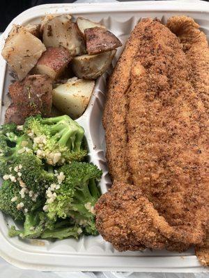 Basa fish with seasoned potatoes and broccoli