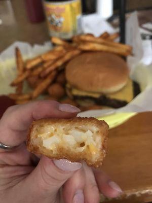 Inside a potato muncher. They are like tater tots with cheese inside