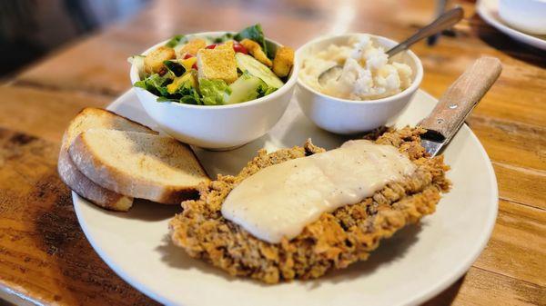 Chicken Fried Steak with mashed potatoes and side salad