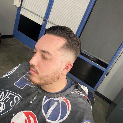 Medium fade slick back by Ramon