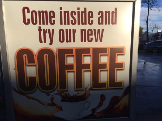 The gas station is advertising its coffee ... when there's a Starbucks attached to the mini mart. Hmmm.