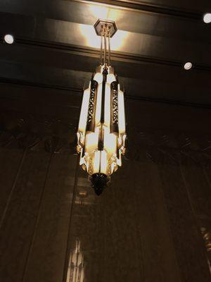 Light fixture, very Art Deco.