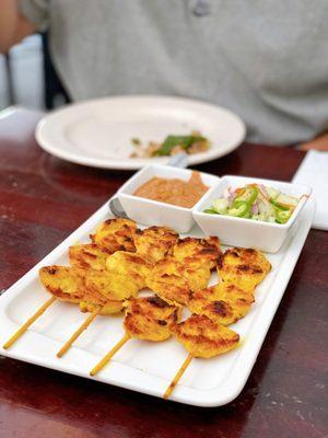 Chicken satay with savory peanut sauce & cucumber salad