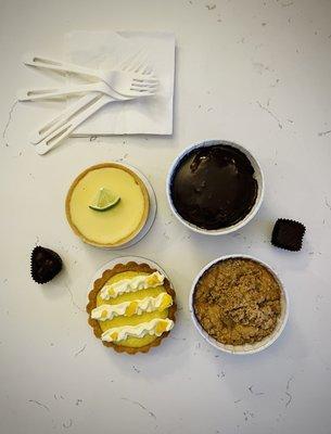 Starting from Bottom Right Corner: Pear Buttermilk Cake, Lemon Mango Tart, Key Lime Tart, Triple Chocolate Cake