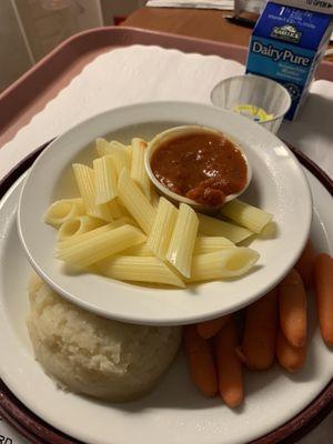 Dry cold Pasta, sauce with Mashed potatoes and carrots!!! I had to giggle. Who eats that combination. HORRIBLE!!!!