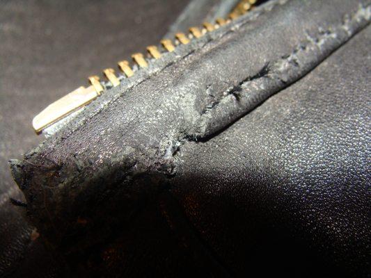 Outside of the coat damaged leather due to repair