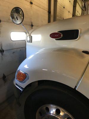 Side mirrors to see the wide wheel wells on this Peterbilt.