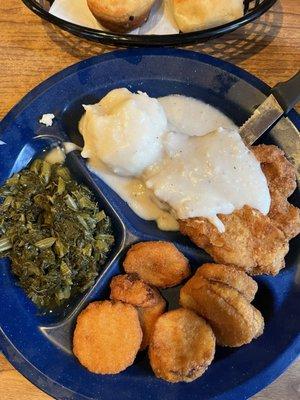 Country Fried Steak w/ white gravy, mashed potatoes, fried yellow squash, turnip greens