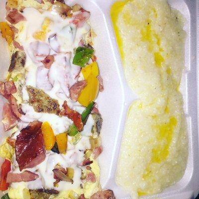 International Omelet with turkey and beef bacon and sausage peppers onions and cheese grits