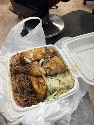 Fried chicken, rice and peas and steamed vege with plantains