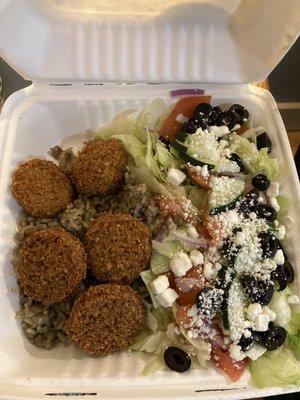 Falafel plate with salad. Bread not pictured.