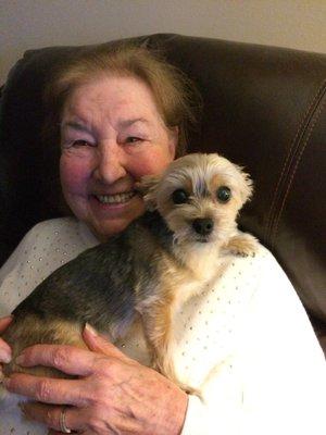 Pet therapy at a long term care facility. Elaine was full of joy to hold Tinkerbelle!