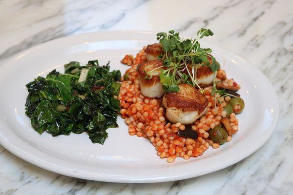 Scallops with cous cous and vegetables