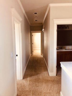 Upstairs hallways super clean (no damage to pristine white baseboards)