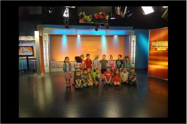 Kids on a field trip at the local news station