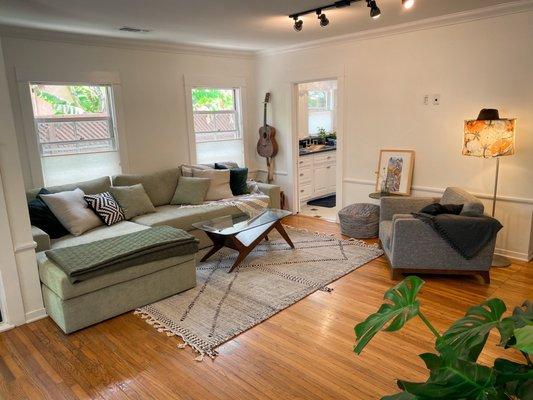 128" sage green sofa with giant twin bed sized chaise.