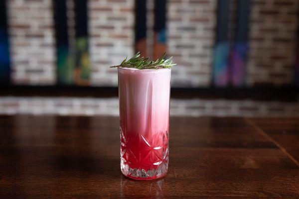 Fizzle Dance
Cranberry infused gin, Rosemary Simple, Lemon Juice, Frothy Egg White