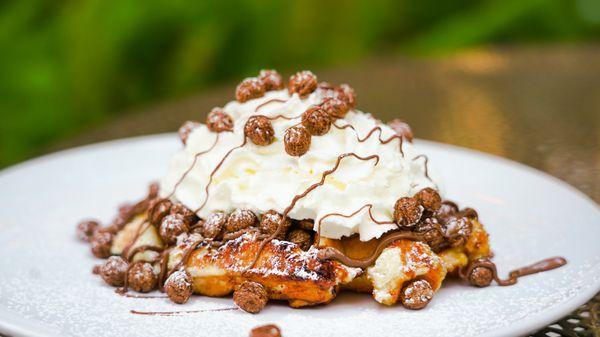 Cocoa Puffs Waffle: Fresh Liege Waffle, Nutella, Cocoa Puffs Cereal topped with fresh house-made Whipped cream