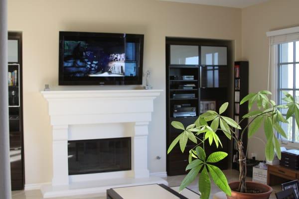 TVs over fireplace or next to niches are very popular locations for our clients