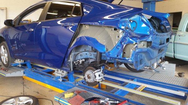 A picture of my car being repaired.