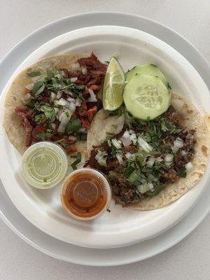 1 carnitas and 1 al pastor taco