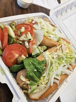 Breaded chicken sandwich with side salad