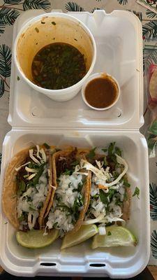 Birria tacos with consome, as well as Lagrimas sauce on the side