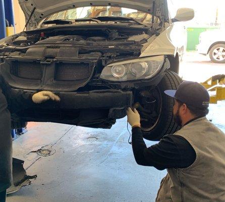 Jose and team putting my 328i hardtop convertible back together after fixing her up good as new!