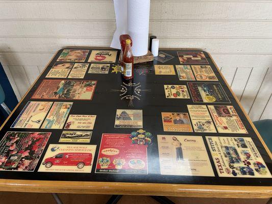 Old school table with local advertisers