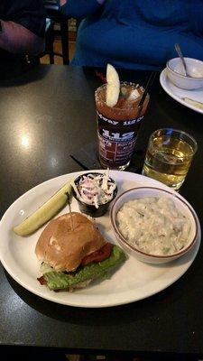 BLT special with bowl of wild rice and the side of coleslaw.