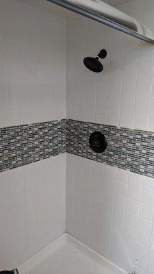 Double to single handle shower valve replacement w/mosaic tile.